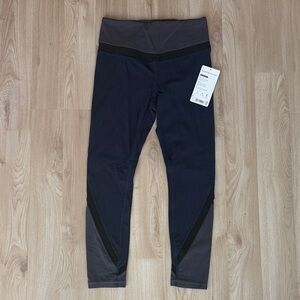 Navy, Black and Gray Athleta Elevation 7/8 Leggings